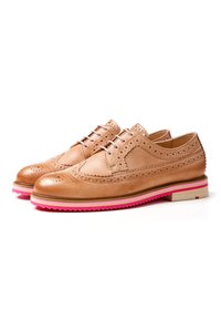 Tan leather brogues with perforated detailing and pink rubber sole. Features a rounded toe and classic lace-up design.