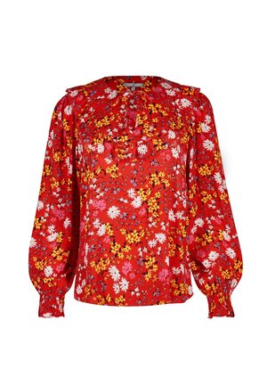 Rød bluse med lange ærmer med gul, hvid og pink blomstret print, flæsekrave og rynkede manchetter.