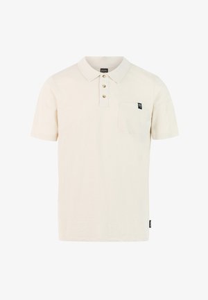 Bež polo majica kratkih rukava s tri gumba, džepom na prsima s malom crnom oznakom i klasičnim ovratnikom.