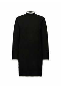 Robe noire en maille avec un col montant, dotée d'accents côtelés blancs au niveau du col et des poignets, silhouette droite, longueur mi-mollet.