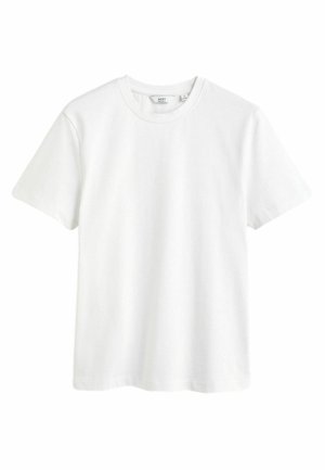 T-shirt bianco in cotone con collo a giro, maniche corte e vestibilità rilassata. Tessuto liscio, senza fantasie o decorazioni.