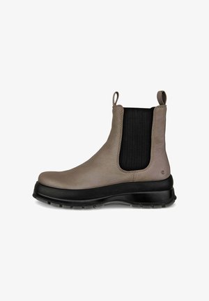 Bottines en cuir marron avec des panneaux élastiques noirs sur les côtés et des languettes de tirage. Semelle en caoutchouc noir épais avec un profil pour l'adhérence. Texture lisse.