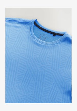 Light blue active t-shirt with a textured geometric pattern, round neckline, and black interior collar accent. Soft, breathable fabric.