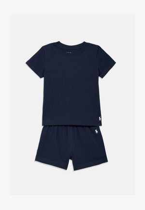 T-shirt bleu marine en coton à manches courtes et shorts assortis. Comprend un col rond, une taille élastique et un petit logo brodé sur les deux pièces.