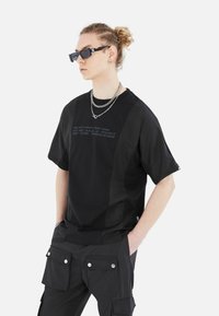 Megaman Print T-shirt - schwarz