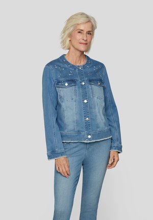 Denim jacket with a collar, featuring two chest pockets, pearl embellishments, a frayed hem, and button closures. Blue gradient tones are visible.