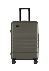 Harde koffer in olijfgroen, met een gestructureerde afwerking, zwart telescopische handvat, zijhandvat en vier wielen voor beweging.