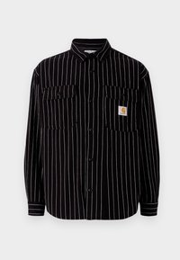Black long-sleeve shirt with white vertical stripes, featuring a spread collar, two chest pockets, and a small logo patch.