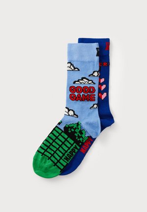 Cotton socks featuring a light blue side with clouds and "GOOD GAME" text, and a blue side with hearts and "HAPPY" in red, green toe accents.