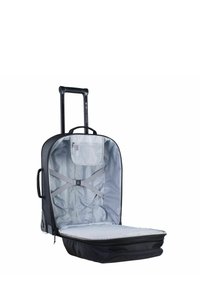 Valigia nera con ruote e scomparto con cerniera; l'interno presenta una fodera grigia, cinghie regolabili e una tasca in rete per l'organizzazione.