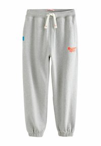 Šedé tepláky vyrobené z jemné tkaniny, s elastickým pásom so šnúrkou, s náplety na členkoch a jasne oranžovým logom "Super Dry".