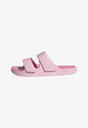 Roze slidesandaal met twee verstelbare bandjes en een textuurzool, met een gewatteerd voetbed met het label 'Cloudfoam' voor comfort.