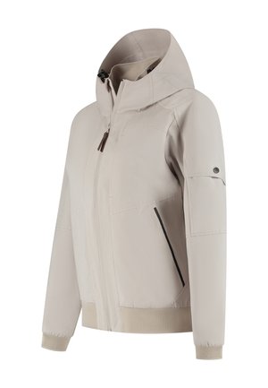 Veste à capuche beige clair avec fermeture éclair sur le devant, poches latérales, poignets en mesh et une poche boutonnée sur le bras gauche.