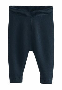 Donkerblauwe gebreide broek met een geribde tailleband en boorden. Soepele textuur, taps toelopende pijpen en een naadloos ontwerp zonder zichtbare stiksels.