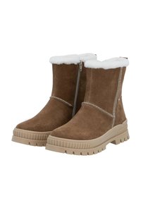 Bottines en suède marron avec un intérieur en fausse fourrure blanche, une fermeture éclair sur le côté et une semelle en caoutchouc beige crantée. Présentent des coutures décoratives le long des bords.