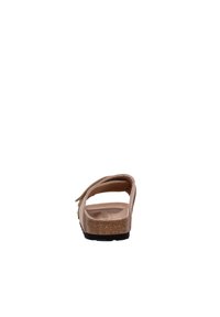 Vue arrière d'une sandale en cuir beige avec une semelle intercalaire en liège et une semelle extérieure en caoutchouc ; dotée d'une seule sangle et d'un design ouvert à l'arrière.