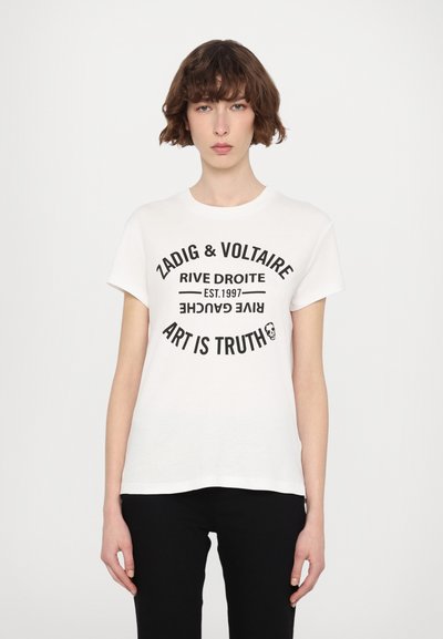 Λευκό βαμβακερό T-shirt με μαυρή γραφική επιγραφή: "ZADIG & VOLTAIRE RIVE DROITE EST. 1997 ART IS TRUTH" μπροστά. Κοντά μανίκια, στρογγυλή λαιμόκοψη.