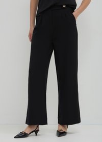 Calliope LUNGO BOTTONE - Pantaloni - nero
