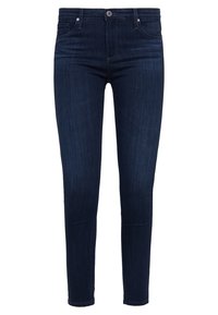 Mörkblå jeans i slim fit med klassisk femfickdesign, metallknäppning och subtila blekningar på tyget.