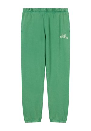 Pantalones deportivos verdes con cintura elástica, puños elásticos y texto blanco "Pacífico Noroeste" en la parte superior del muslo izquierdo.