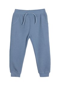 Blaue gerippte Jogginghosen mit einem elastischen Bund, verstellbarem Kordelzug und zwei seitlichen Taschen. Mit enganliegenden Bündchen an den Knöcheln abgeschlossen.