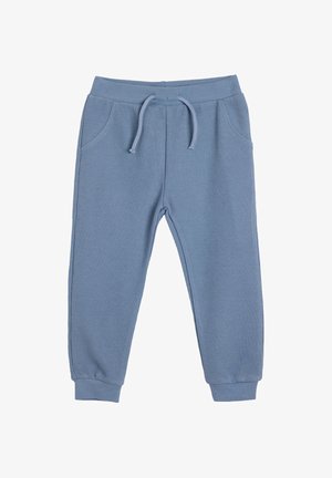 Blå ribbede sweatsbukser med elastisk talje, justerbar snor og to sidelommer. Afsluttet med tætsiddende manchetter ved anklerne.