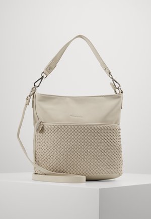 Beżowa torebka z gładkim górnym panelem i plecionym dolnym panelem. Posiada pojedynczy regulowany pasek oraz kieszeń na zamek. Akcenty z srebrnym okuciem.