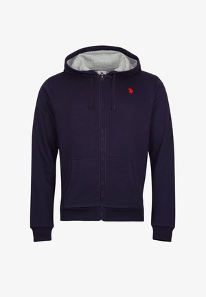 Temna zip-up kapuca s sivo notranjostjo, vrvicami, sprednjimi žepi in majhnim rdečim logotipom na prsih. Narejena iz mehkega materiala.