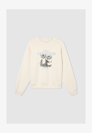 Felpa color crema con collo rotondo e maniche lunghe, caratterizzata da una grafica stampata di due gattini e dal testo "Coordinatori del Caos".