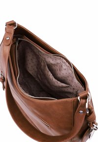 Hnědá kožená taška s uzavíráním na zip, se vnitřní kapsou a podšívkou s puntíky. Zaoblený design s akcenty ve stříbrné barvě.