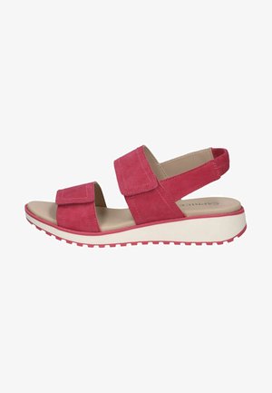 Sandale roz din suede cu două curele late ajustabile, talpă interioară căptușită și talpă din cauciuc albă cu textură antiderapantă.