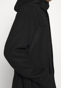 Nudie Jeans Klassisk kappa / rock - dark blue