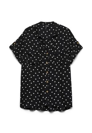 Melna īsroku blūze ar baltām punktiņām, priekšpusē ar pogām, divām krūšu kabatām un piedurkņu atloki ar pogām, izklāta plakana uz balta fona.
