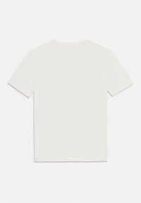 T-shirt à manches courtes en coton crème, avec un col ras du cou classique et un design simple sans logos ni motifs visibles.
