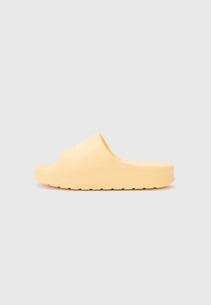 SERVE - Kummikingad - neon yellow