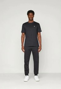 Champion ICONS CUFF PANTS - Treningo apatinė dalis - black