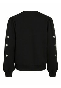 Sweatshirt noir avec des manches bouffantes et un ourlet côtelé. Présente de petites découpes en forme de cœur blanches le long des manches pour ajouter du détail. Tissu doux et texturé.