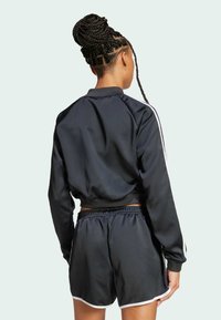 adidas Originals Majica s kapuljačom i patentnim zatvaračem - black