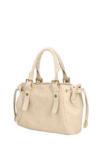 Lichtbeige suède handtas met twee korte handvatten, gouden hardware accenten, trekkoordsluiting en een zachte textuur.