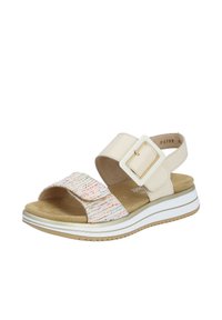 Sandali beige con una larga fascia testurizzata, caratterizzati da cuciture multicolori, una cinghia alla caviglia regolabile e una suola bianca spessa.