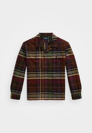 Chemise à manches longues à carreaux de couleur marron foncé, présentant des rayures vertes, violettes et orange, avec deux poches poitrine et un col à bouton.