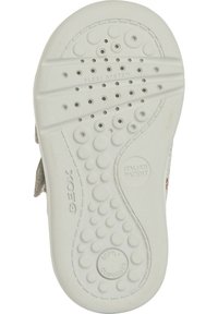 Suela de zapato de goma blanca con superficie texturizada que presenta patrones circulares y ovalados, etiquetada como "SISTEMA FLEXY" y "PATENTE ITALIANA."