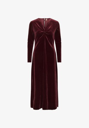 Burgundy velvet dress with long sleeves, V-neck, and a center twist detail. Full-length design with a smooth texture and a back zipper closure.