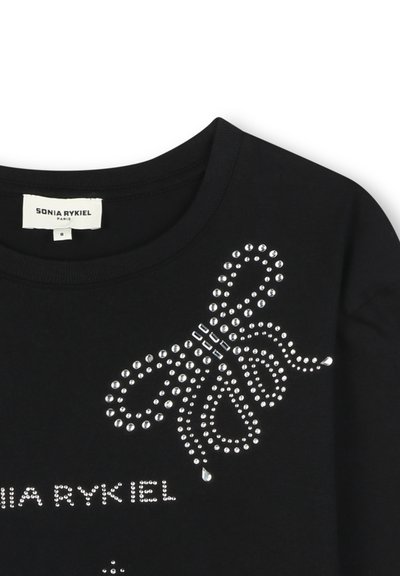 Black cotton t-shirt featuring a decorative rhinestone design of a bow and brand name "Sonia Rykiel" in a glittering text below.