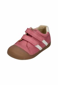 Pink leather shoe with white stripes, two Velcro straps, and a brown rubber sole. Rounded toe design with textured upper surface.