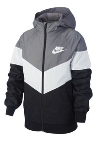 Nike bunda s kapucí, barevně členěná v �šedé, bílé a černé, s předním zipem a elastickými manžetami. Výrazný detail loga.