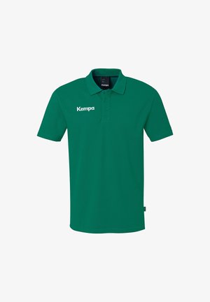 Green polo shirt made of breathable fabric featuring a three-button placket, short sleeves, and a white "Kempa" logo on the left chest.