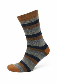 Gestreifte Socke in Braun, Marineblau und Grau. Texturiertes Strickdesign mit geripptem Bündchen und verstärktem Zehenbereich. Mittlere Schafthöhe mit kontrastierenden Farben.