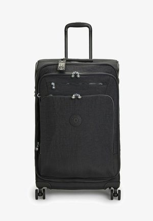 Valise souple noire avec plusieurs poches zippées, poignée télescopique, quatre roues et une finition texturée. Présente un logo à l'avant.