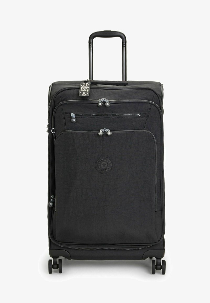 Black soft-sided suitcase with multiple zippered pockets, telescoping handle, four wheels, and a textured finish. Features logo on front.